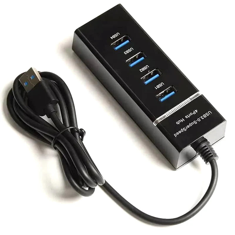 Black USB hub with multiple ports and a cable on a white background